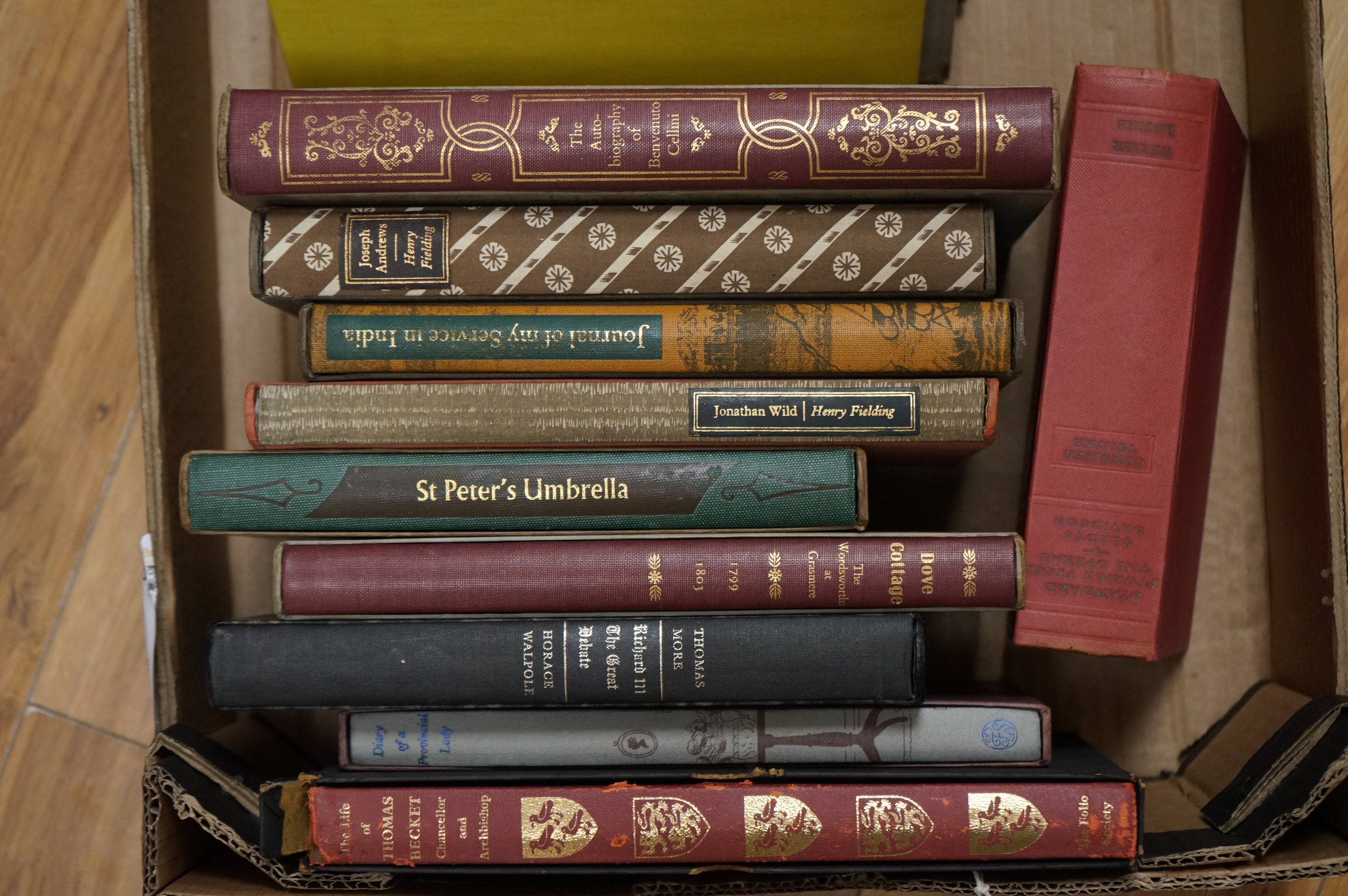 A collection of eighteen Folio Society books to include St Peter’s Umbrella and the Autobiography of Benvenuto Cellini
